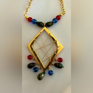 Multi colored gold necklace and earring set